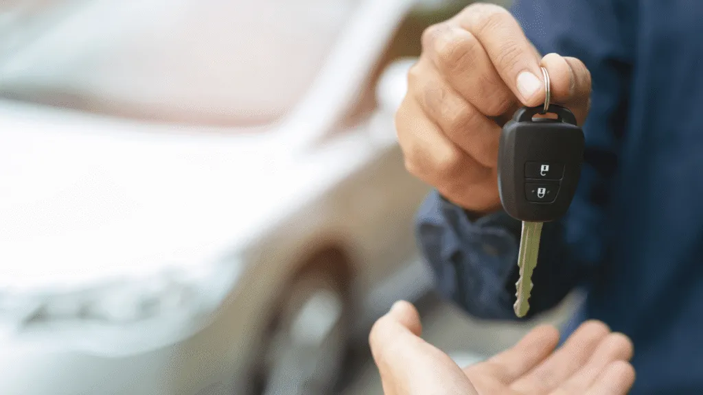 Keys being given to a client for their vehicle which augments the blog article titled: Rent to Buy vs Car Financing: Renault Kwid